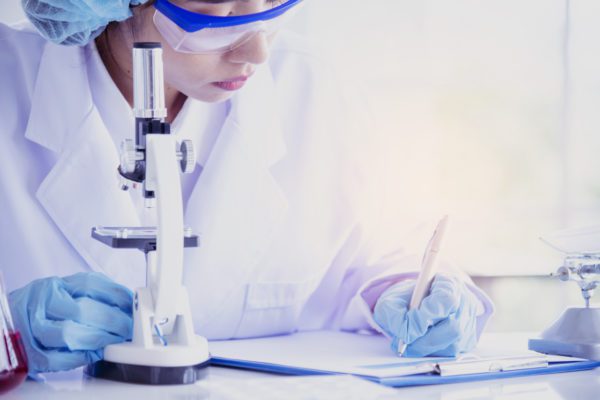 medical lab tech analyzing samples